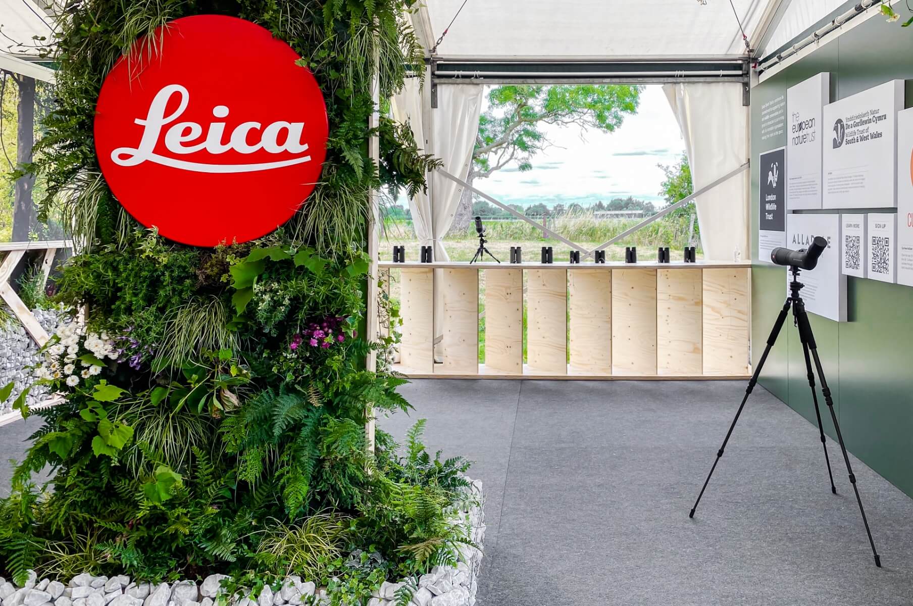 Viewing gallery within a modular Leica exhibition stand, designed to guide visitor flow and enhance experiential engagement.